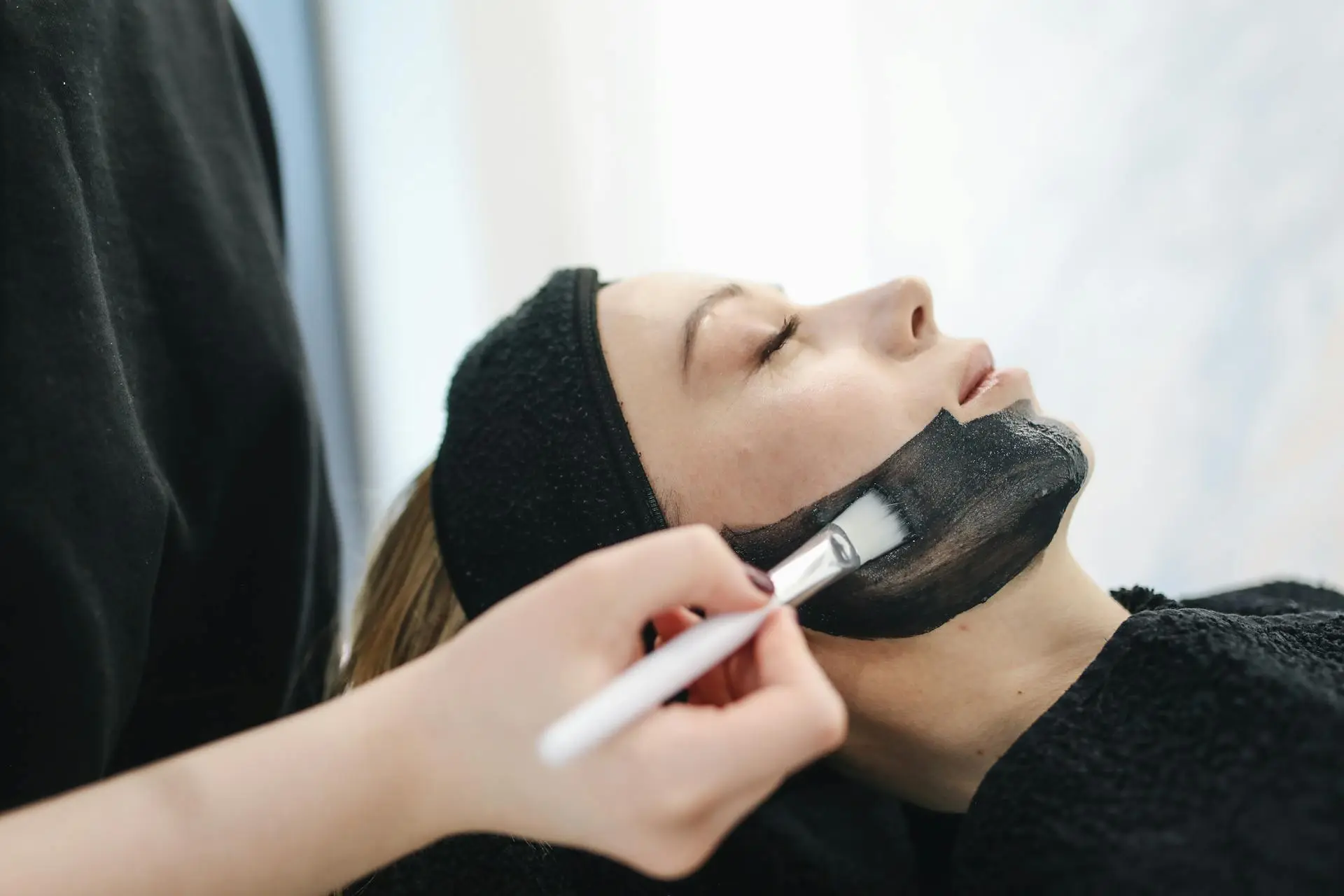 Skin care professional working with a customer