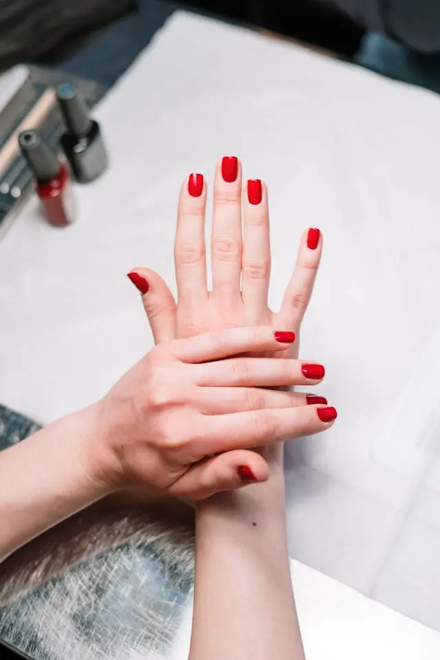 Vibrant red nails with a sultry finish — for bold and confident looks.